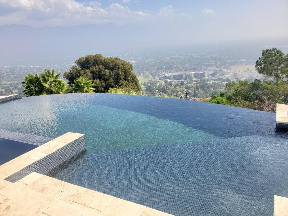 Omega's hillside infinity pool website redesign
